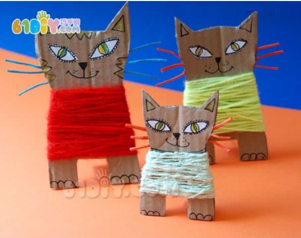 Small creative idea from waste cardboard and yarn, three-dimensional cute kitten