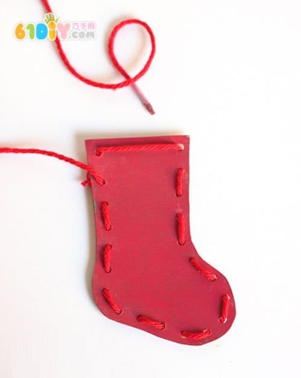 Christmas childrens handmade stringed Christmas stockings and Christmas tree