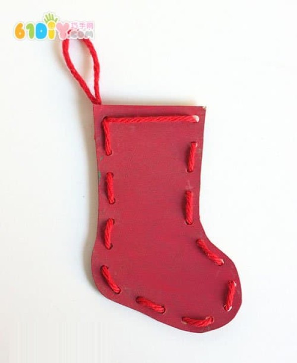 Christmas childrens handmade stringed Christmas stockings and Christmas tree