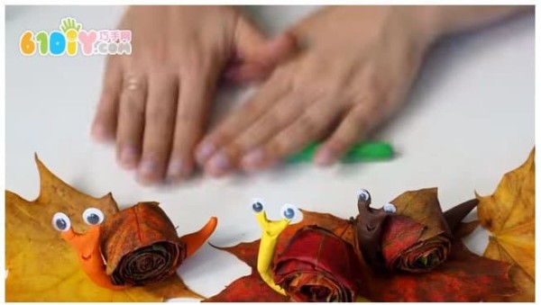 Childrens handmade leaf clay snails