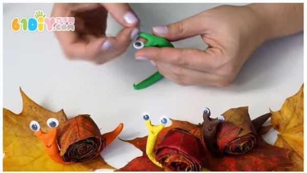 Childrens handmade leaf clay snails