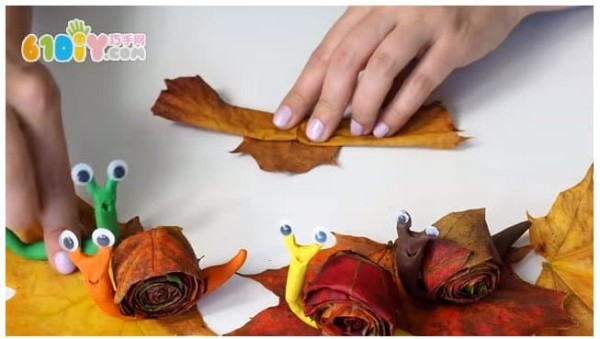 Childrens handmade leaf clay snails