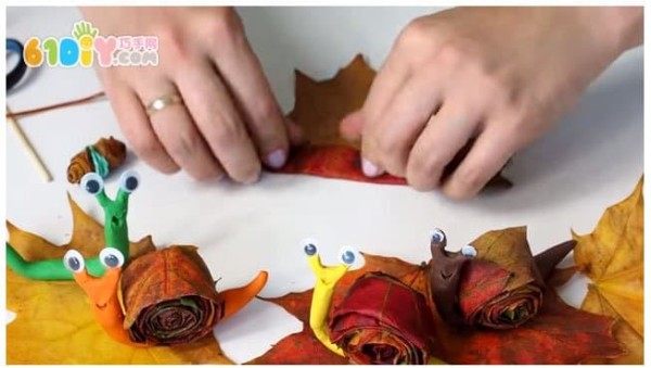 Childrens handmade leaf clay snails