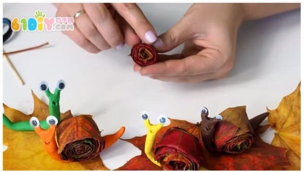 Childrens handmade leaf clay snails