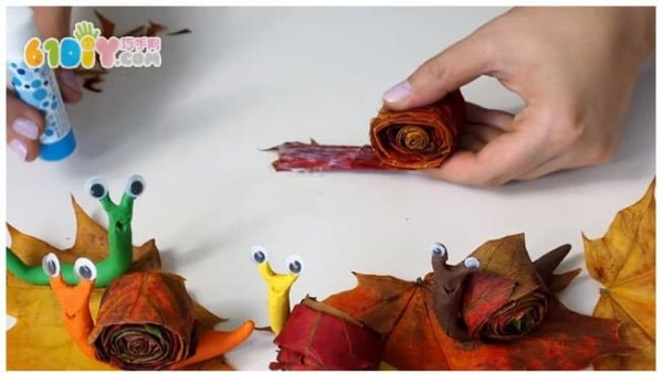 Childrens handmade leaf clay snails