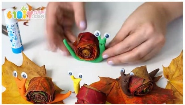 Childrens handmade leaf clay snails