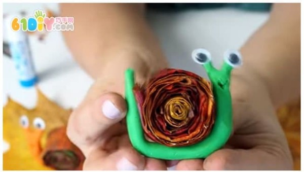 Childrens handmade leaf clay snails