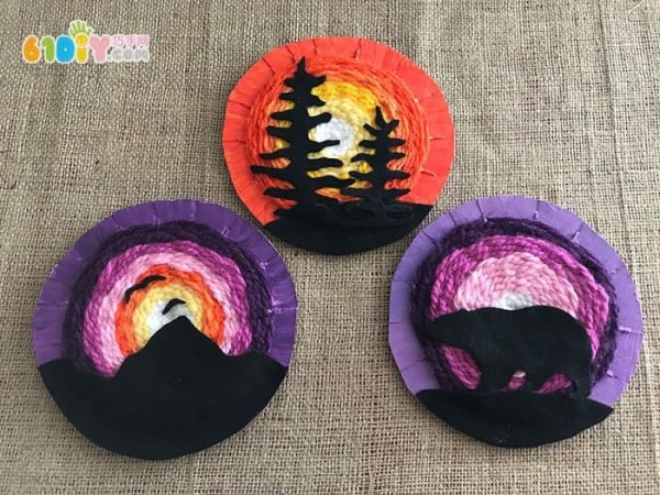 Handmade beautiful sunset from waste cardboard and yarn