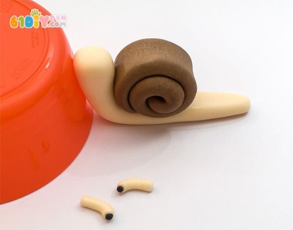 Childrens clay making cute little snail