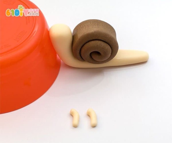 Childrens clay making cute little snail