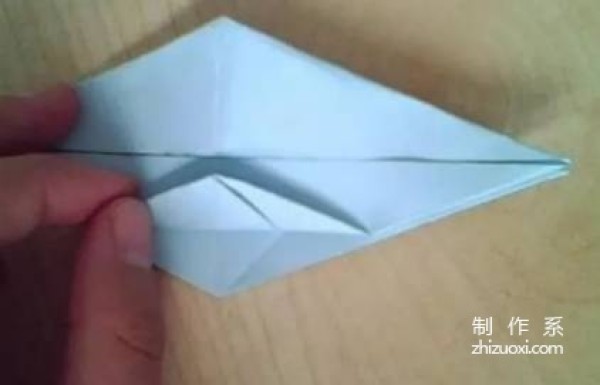 Illustration of how to fold a simple paper crane