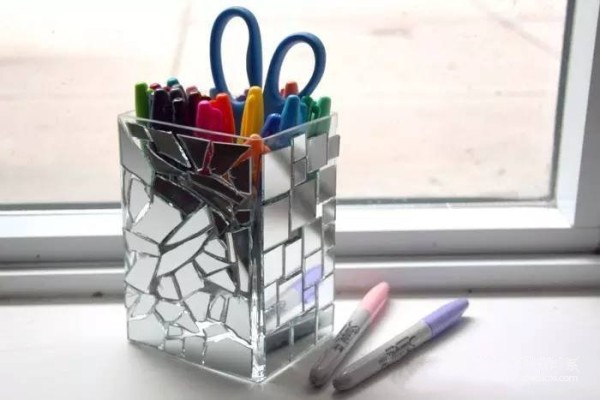 DIY illustration of hand-made colorful and creative pen holder from broken glass