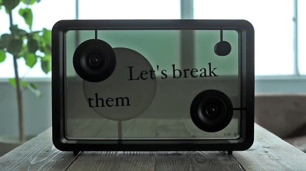 Transparent speaker showing lyrics