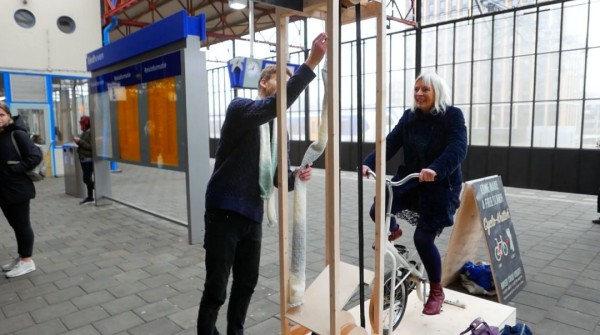 Handsome Dutch boy invents waiting tool and knits scarf while waiting