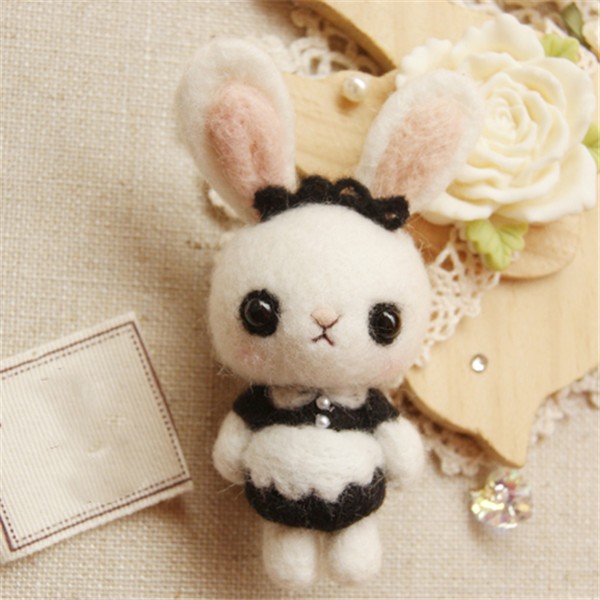 Cute handmade wool felt bunny in maid outfit