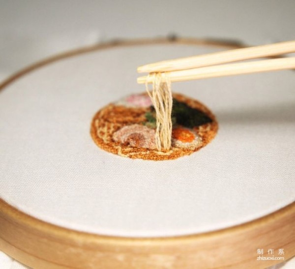 Using needles and threads instead of paintbrushes to embroider traditional Japanese delicacies