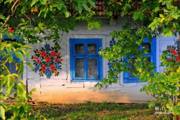 Plant flowers all over the wall, and accidentally the village becomes a fairy tale