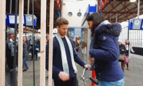 Handsome Dutch boy invents waiting tool and knits scarf while waiting