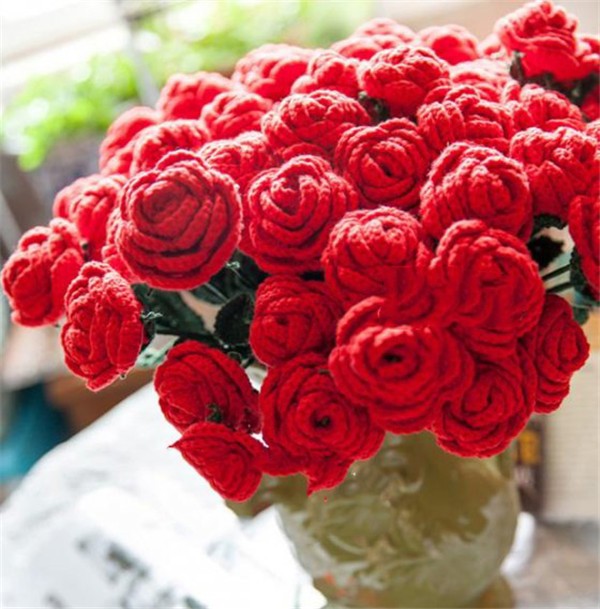 Romantic handmade red roses made by creative crochet DIY