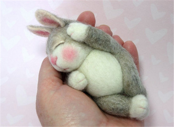 Adorable sleeping bunny made of handmade wool felt