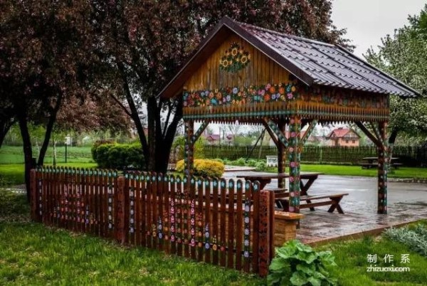 Plant flowers all over the wall, and accidentally the village becomes a fairy tale