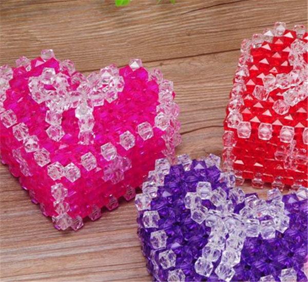 Handmade DIY beaded weaving to make a heart-shaped bow gift box