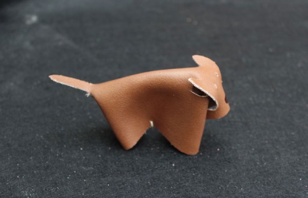 Cute puppy made of scrap leather