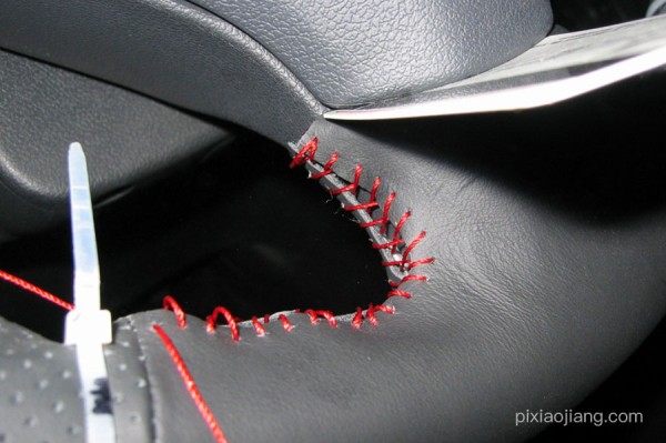 Hand-stitched steering wheel cover