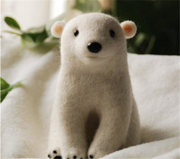 Cute DIY polar bear made from handmade wool felt