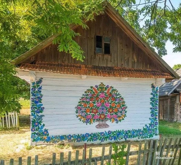 Plant flowers all over the wall, and accidentally the village becomes a fairy tale