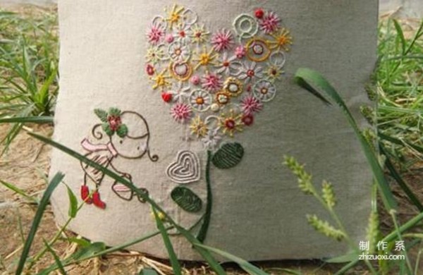 Love Tree is a beautiful hand-embroidered work with detailed steps and drawings of the embroidery method.