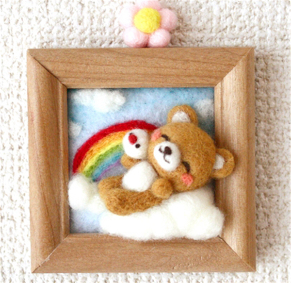 Various cute three-dimensional handmade photo frames of small animals made of wool felt