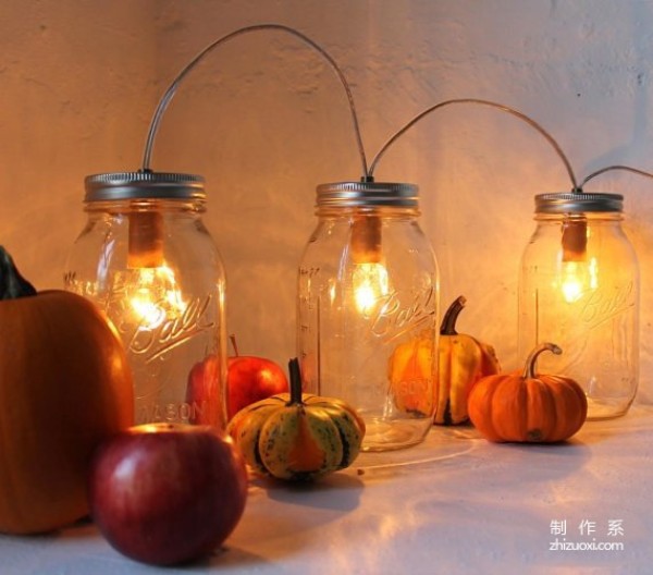 Using waste glass jars to create romantic Christmas lamps