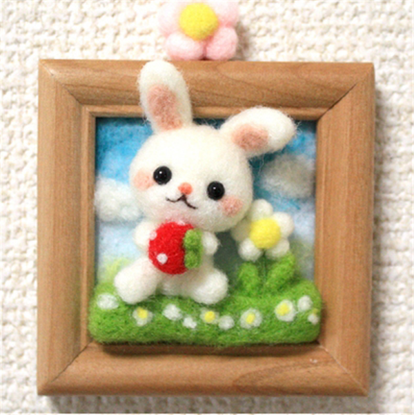 Various cute three-dimensional handmade photo frames of small animals made of wool felt