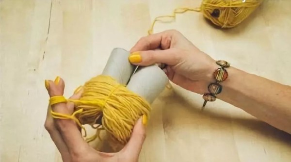 Simple method of making yarn ball pendants