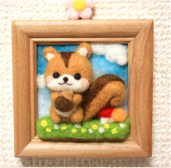 Various cute three-dimensional handmade photo frames of small animals made of wool felt