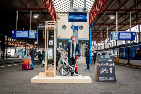 Handsome Dutch boy invents waiting tool and knits scarf while waiting