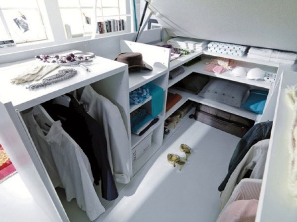 Combination of wardrobe and bed