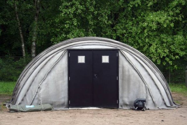 Temporary housing invented abroad, watered and hardened like concrete