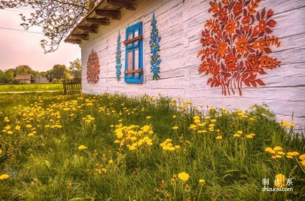 Plant flowers all over the wall, and accidentally the village becomes a fairy tale