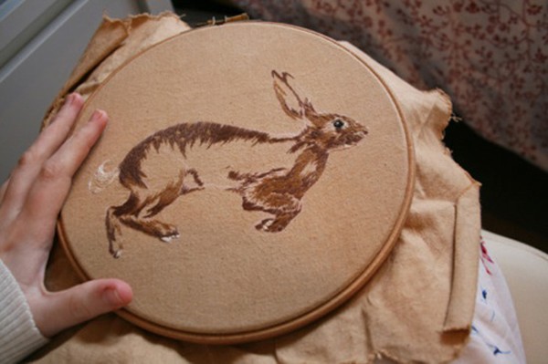 Appreciation of handmade DIY embroidery of small animal products on the ground