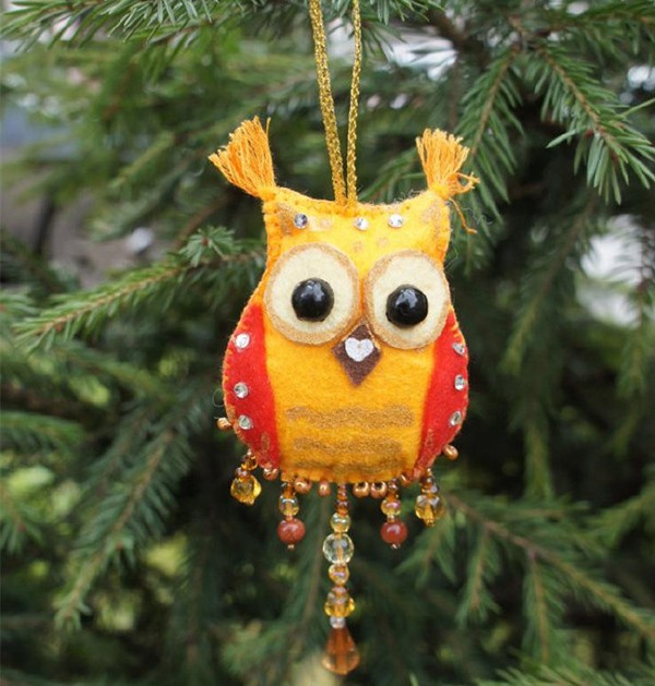 Handmade DIY owl pendant combining fabric and beads