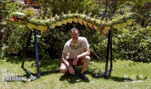 A dragon carved from watermelon and pineapple