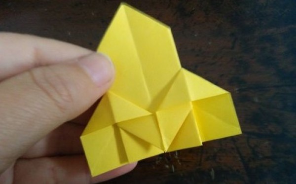 Childrens manual origami tutorial teaches you how to fold rockets