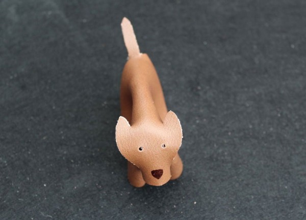 Cute puppy made of scrap leather