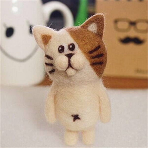 Various cute handmade wool felt pocket animals