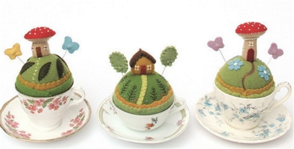 Creative handmade wool felt DIY small house in a tea cup