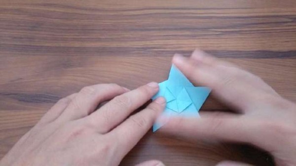 Fun origami for children. Teach children to fold a simple five-pointed star.