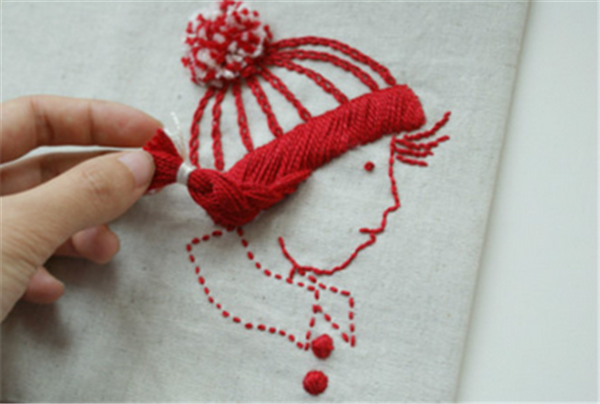 A little girl with braids, artistic and fresh hand embroidery made by DIY