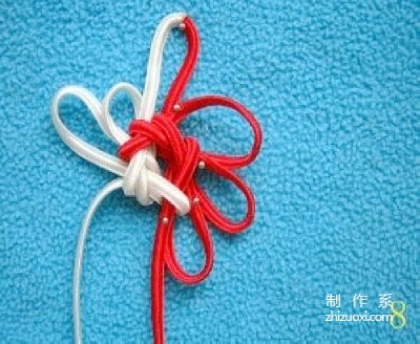 Illustration of the knitting method of the Chinese knot with eight ears and hollow brocade knot, tutorial on how to tie the hollow knot with eight ears and brocade